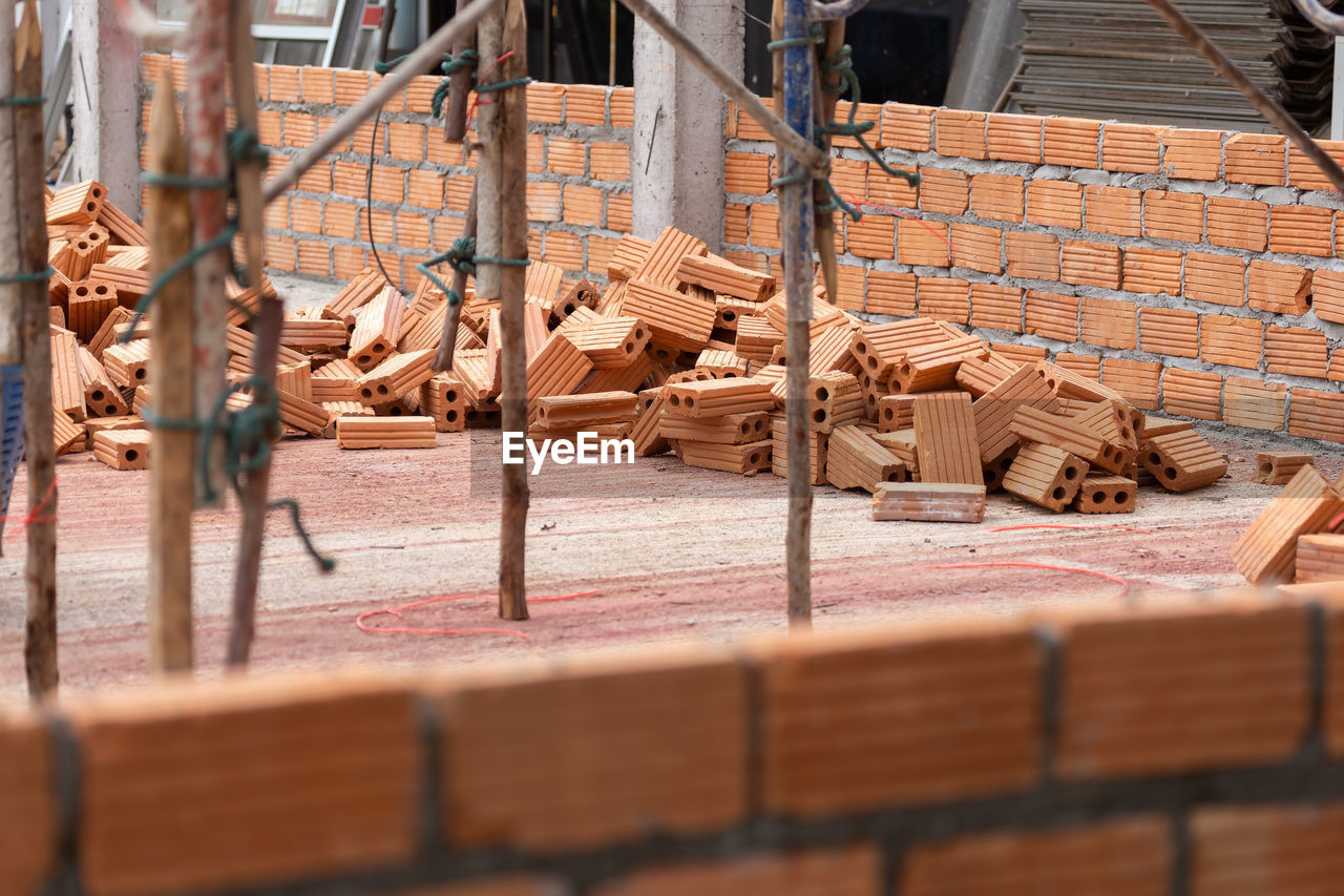 Stack of wood at construction site