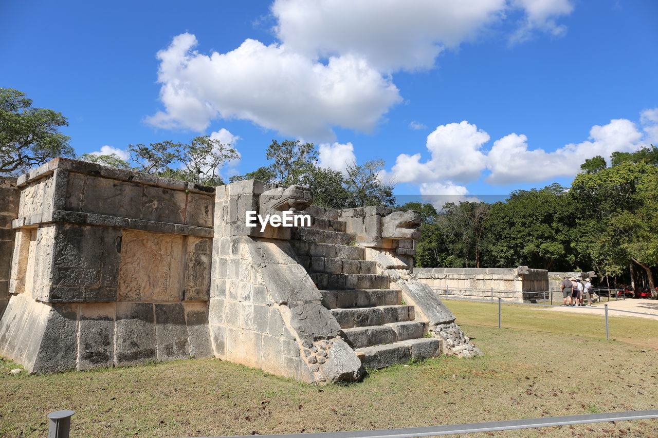 Built structure against cloudy sky