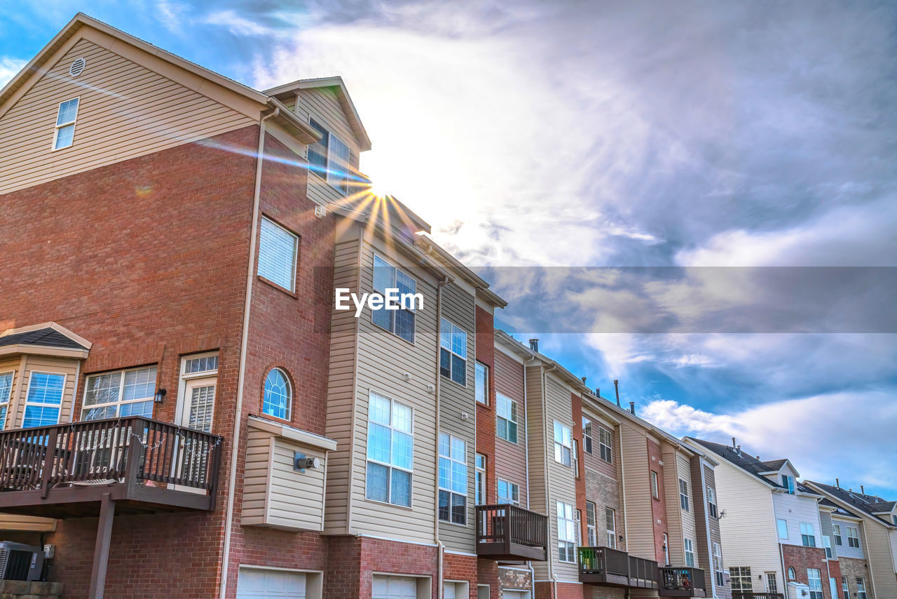 LOW ANGLE VIEW OF RESIDENTIAL BUILDING