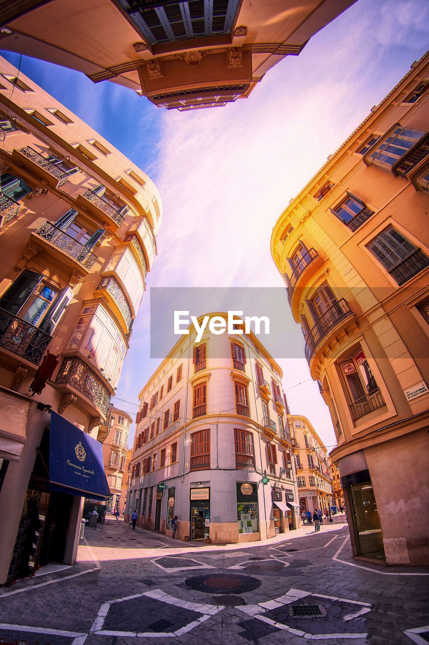 LOW ANGLE VIEW OF CITY BUILDINGS AGAINST SKY