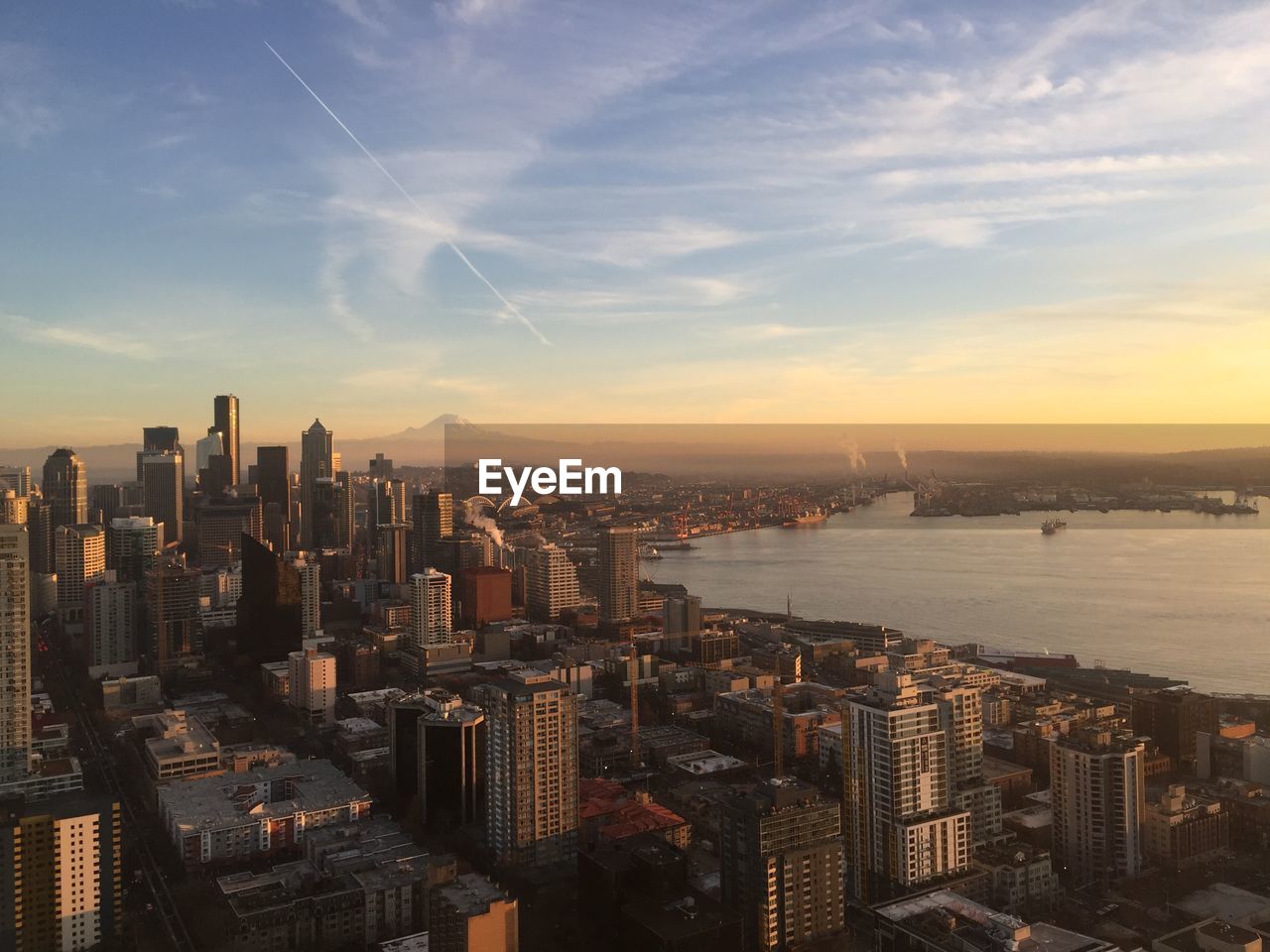 Aerial view of city at sunset