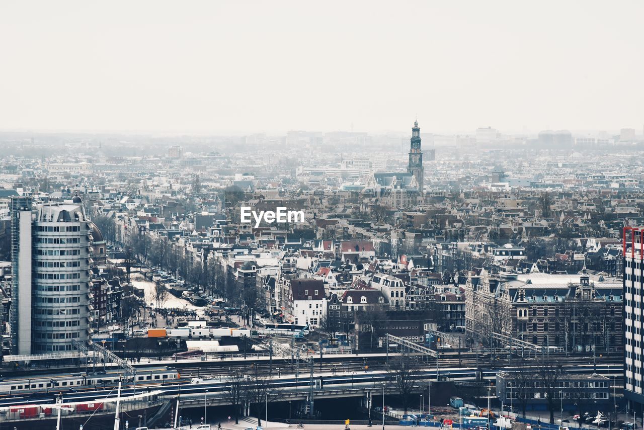 HIGH ANGLE VIEW OF BUILDINGS IN CITY