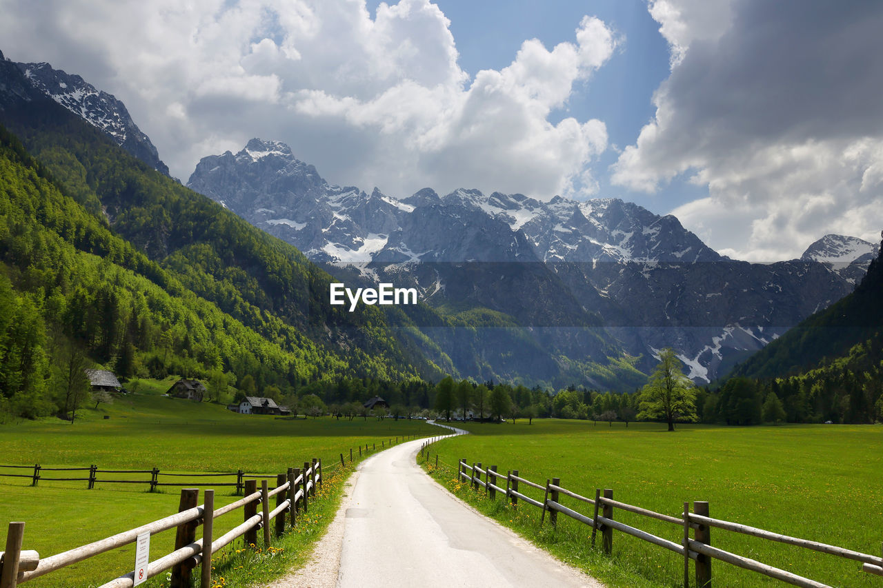 scenic view of landscape and mountains against sky