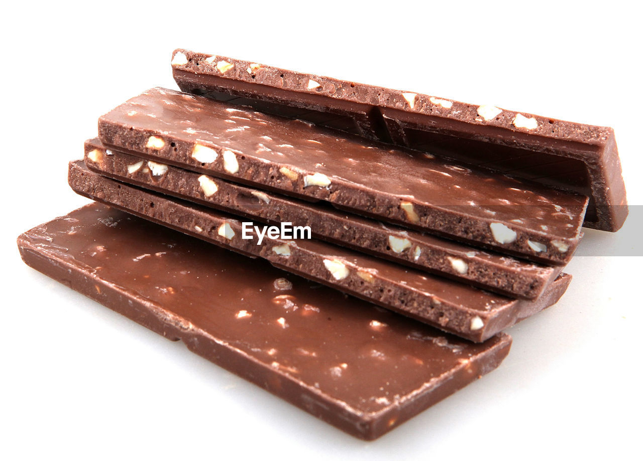 Close-up of chocolate bars on white background