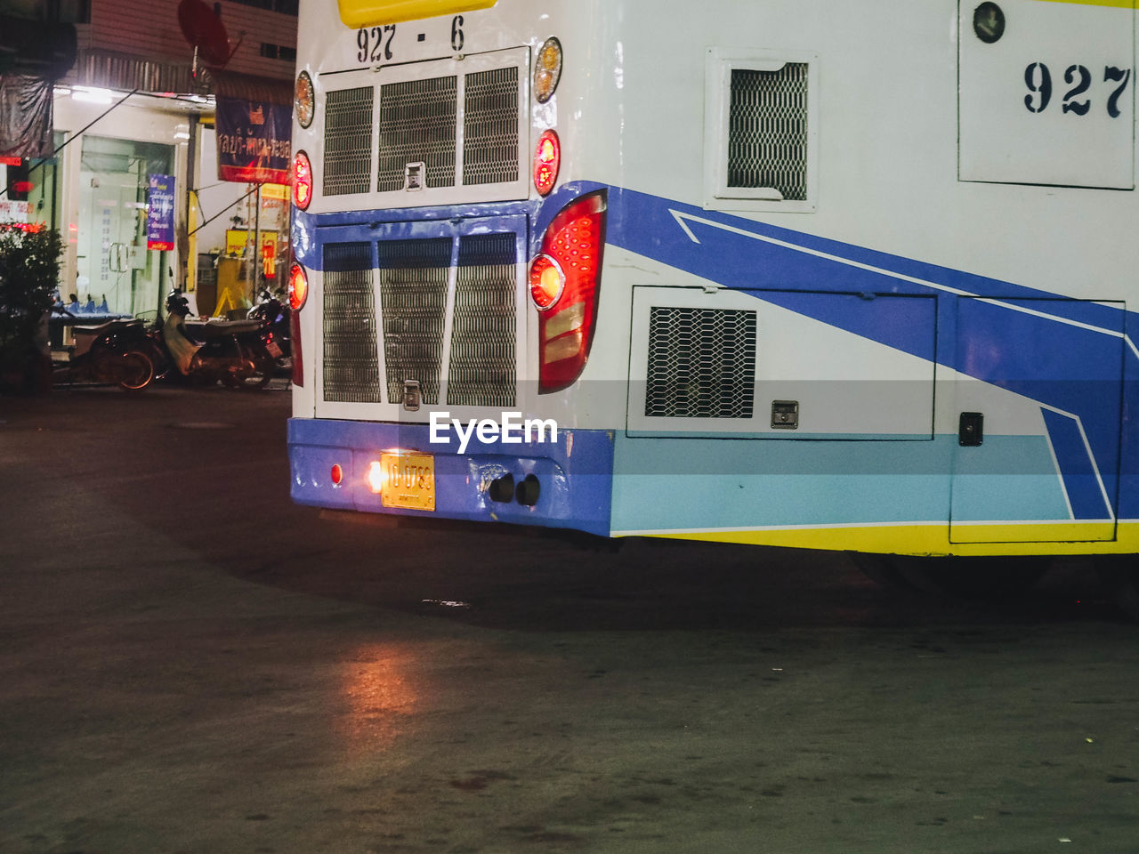 CARS ON ILLUMINATED CITY DURING NIGHT