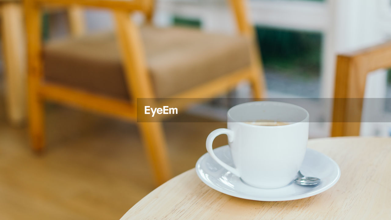 Close-up of tea cup on table