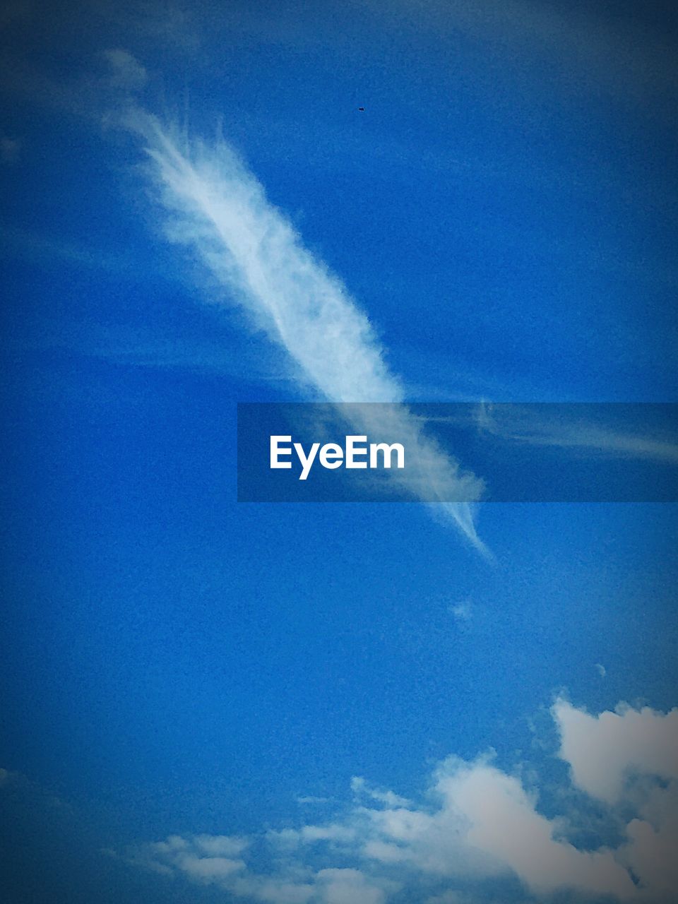 Low angle view of white clouds in blue sky