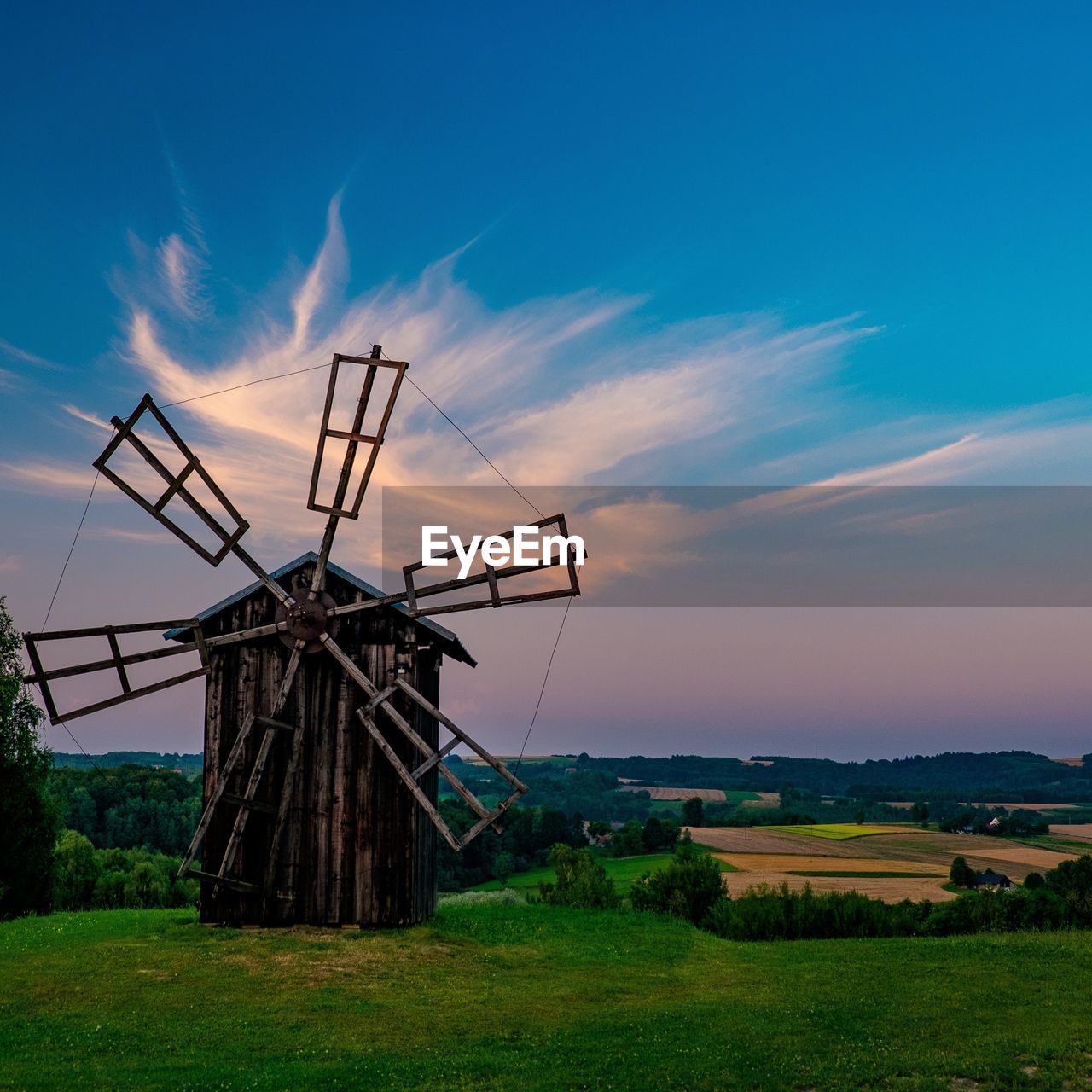 low angle view of windmill against sky