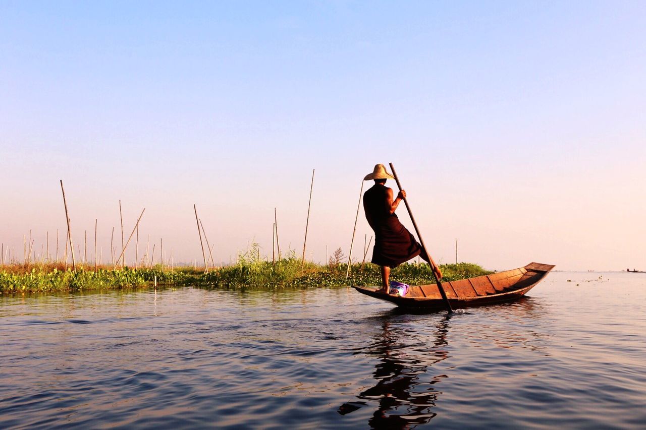 View of person in boat at lake