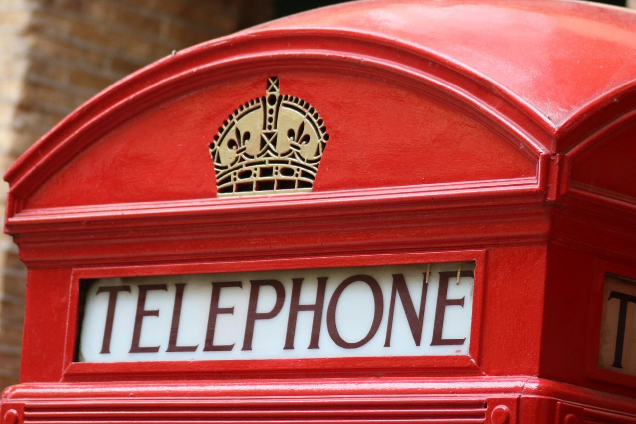 Close-up of red telephone booth