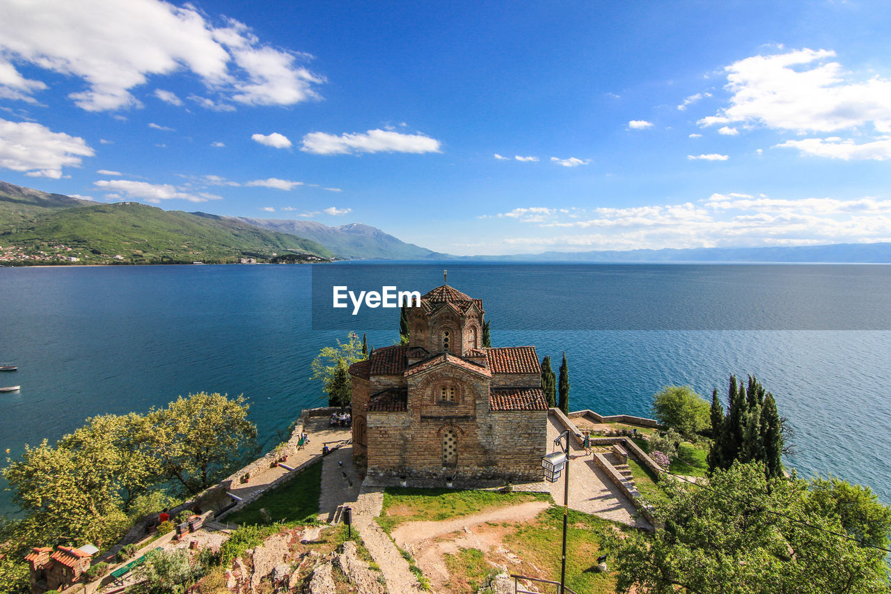 Scenic view of sea against cloudy sky