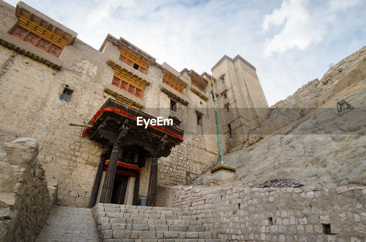 LOW ANGLE VIEW OF OLD BUILDING