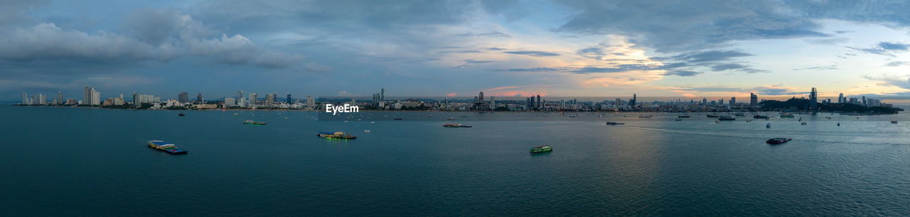 high angle view of boats in sea against sky during sunset