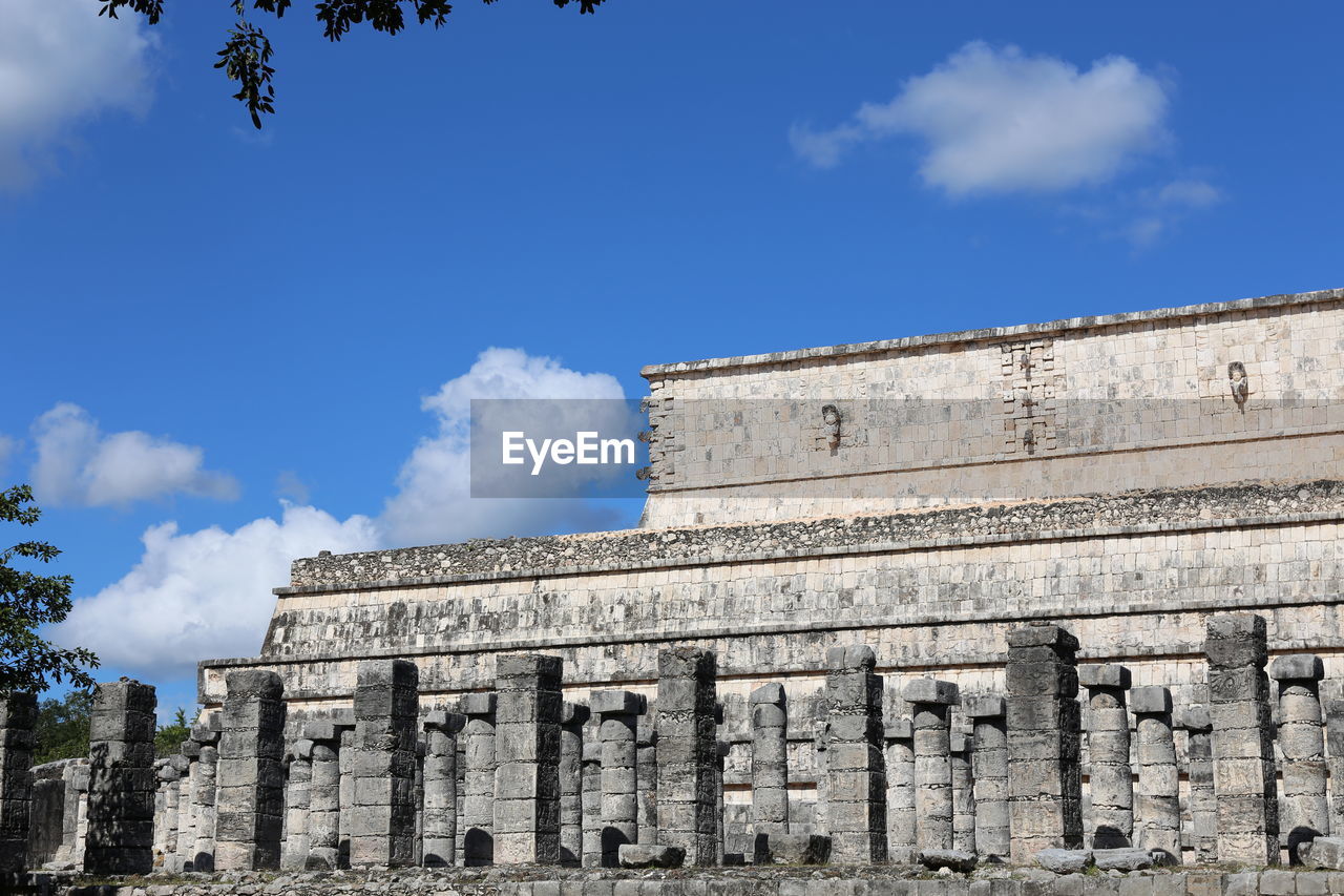 Low angle view of old building against sky