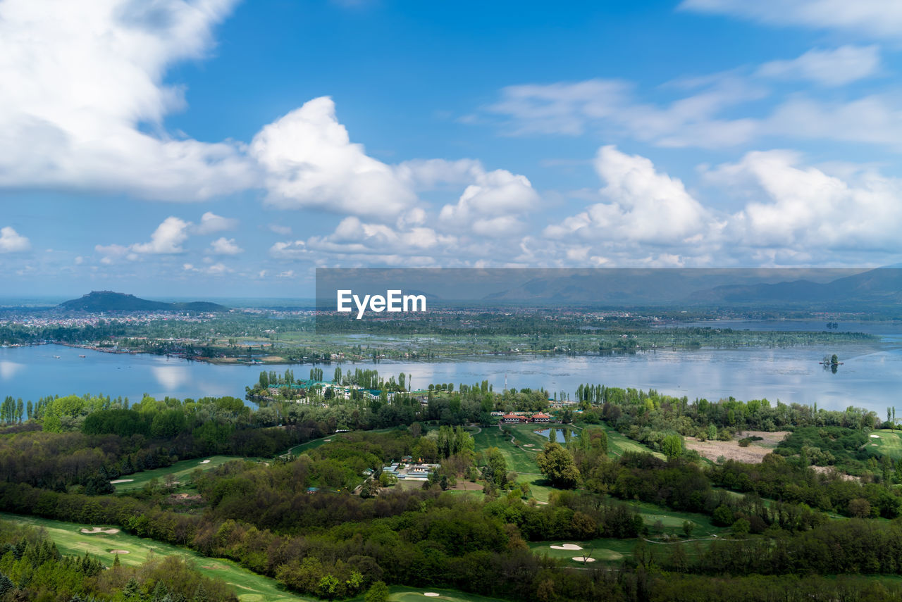 SCENIC VIEW OF LANDSCAPE AND LAKE AGAINST SKY