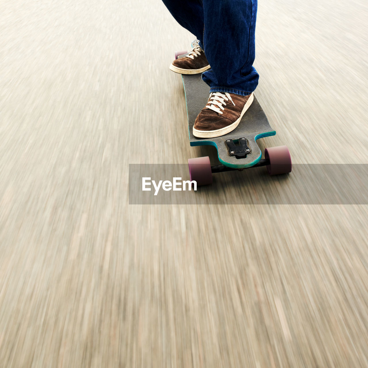 Low section of man walking on floor