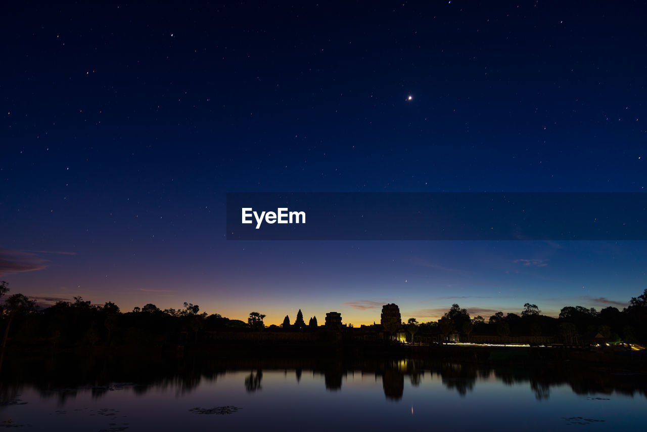 SCENIC VIEW OF LAKE AT NIGHT