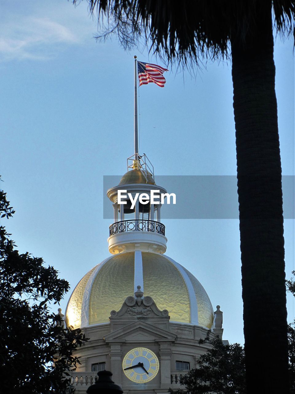 LOW ANGLE VIEW OF FLAGS AGAINST SKY