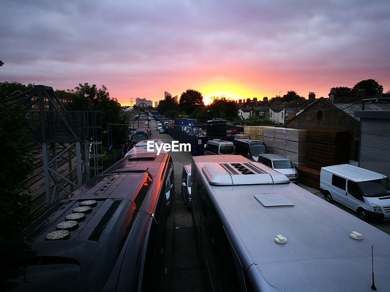 HIGH ANGLE VIEW OF CITY STREET AT SUNSET