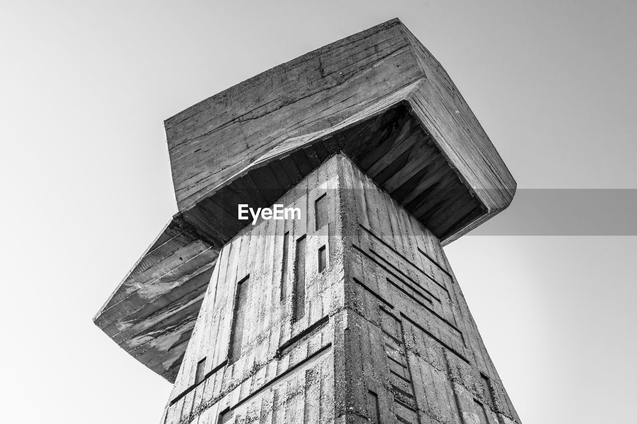 LOW ANGLE VIEW OF OLD TOWER AGAINST SKY