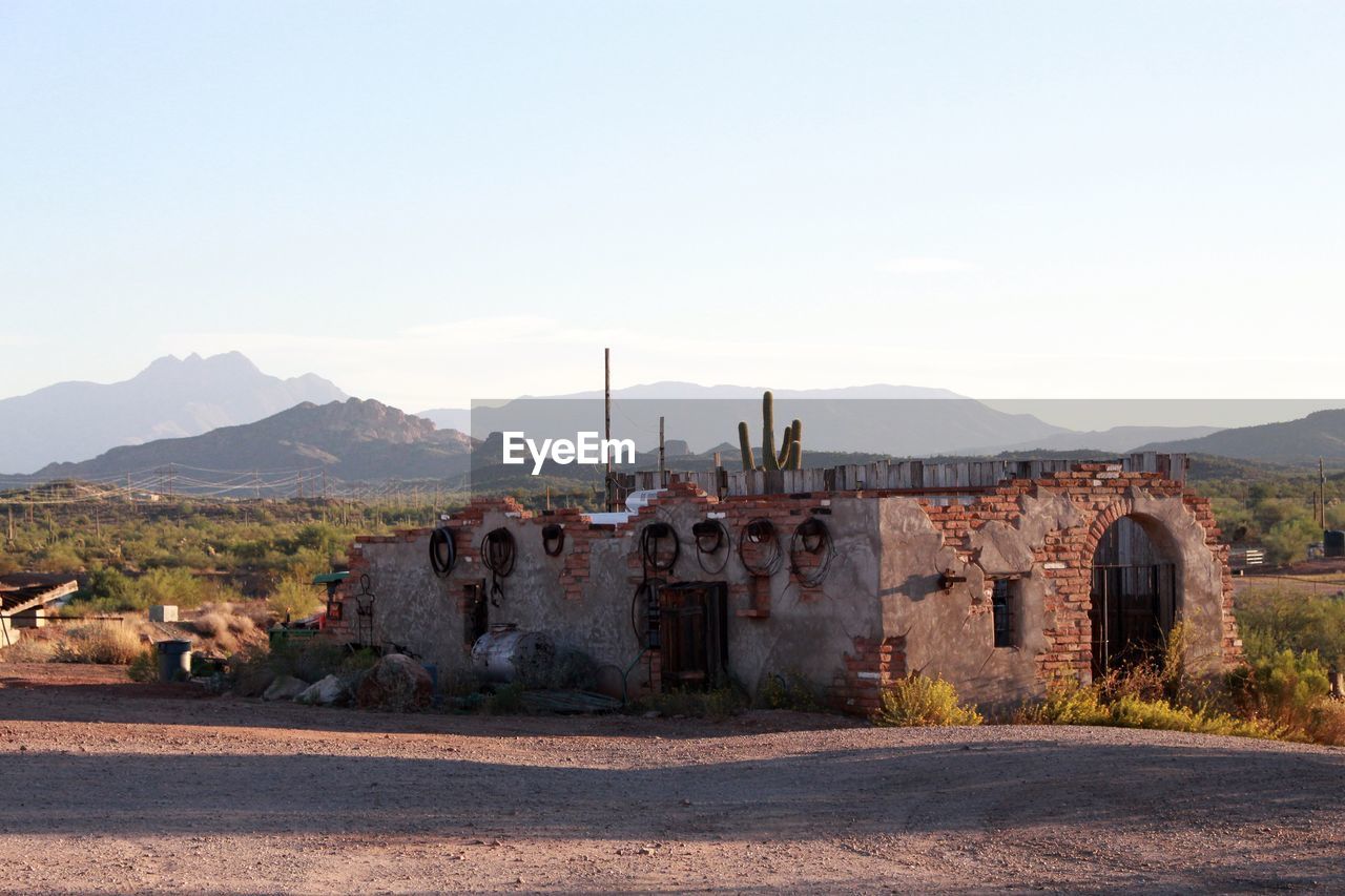 Abandoned built structure against clear sky