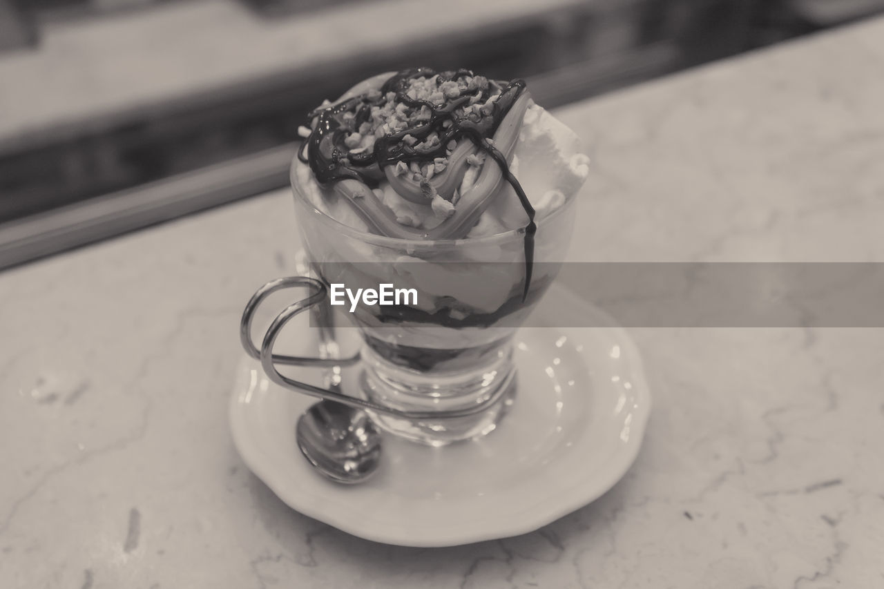 CLOSE-UP OF DRINK WITH ICE CREAM