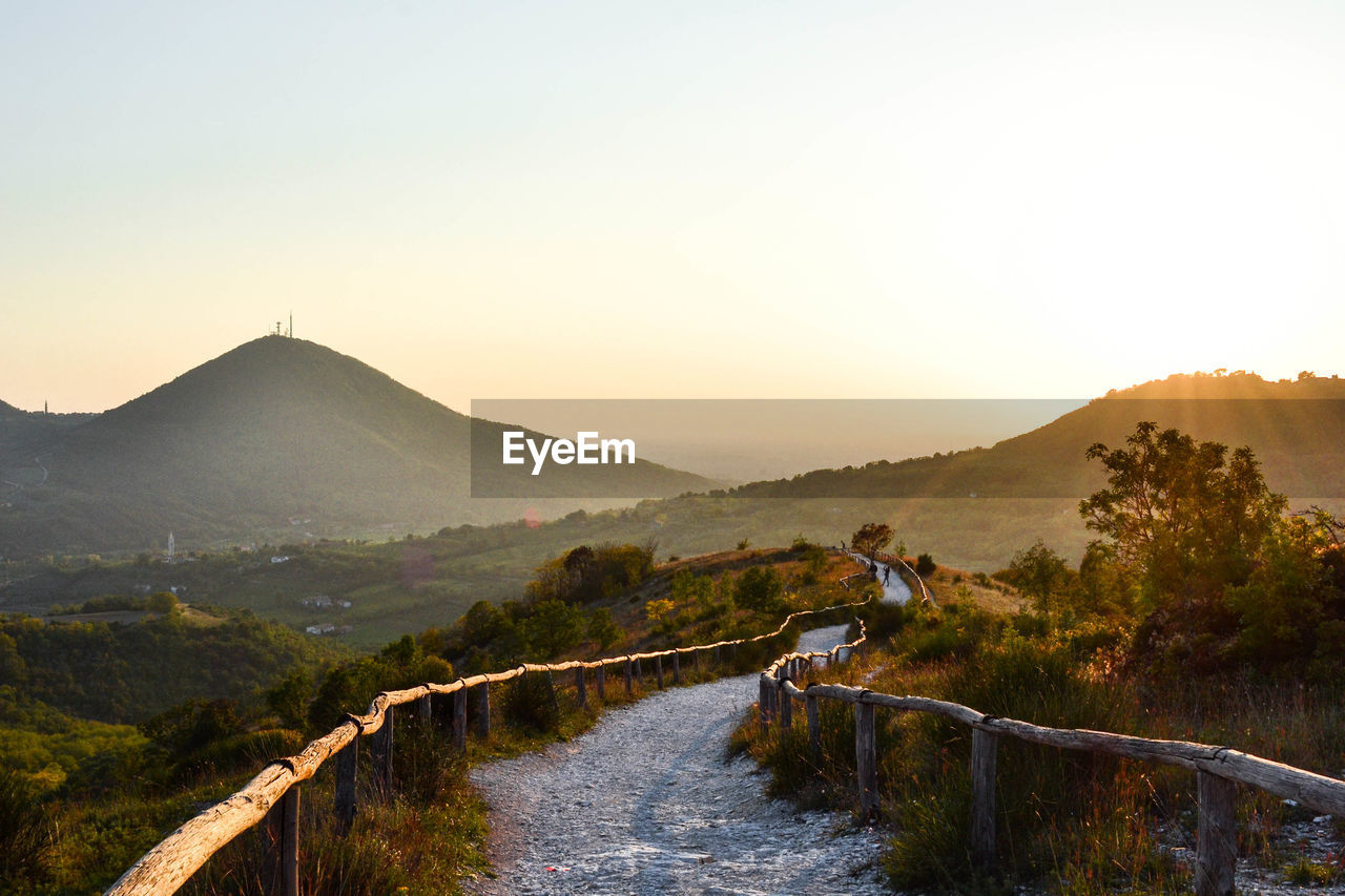 Scenic view of landscape against sky during sunset