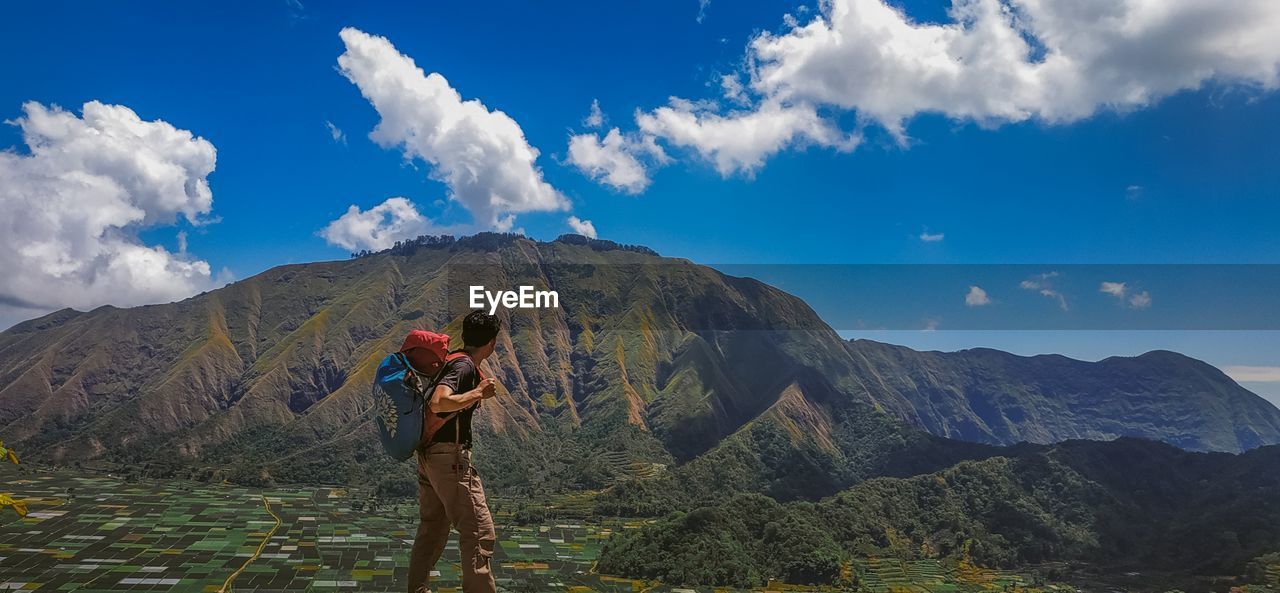 A man was walking on a very beautiful mountain