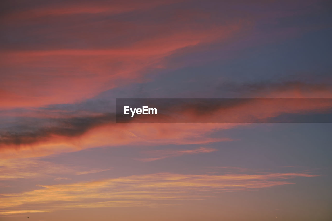 low angle view of dramatic sky during sunset