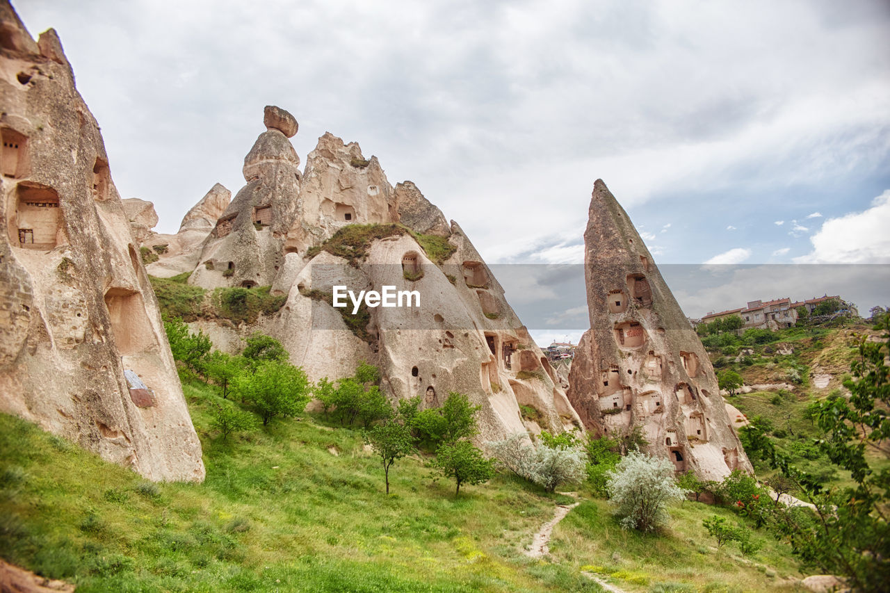 ROCK FORMATIONS AGAINST SKY