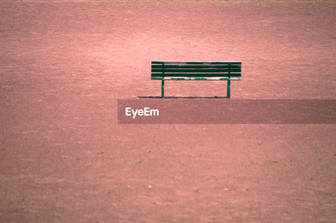 Empty bench in park