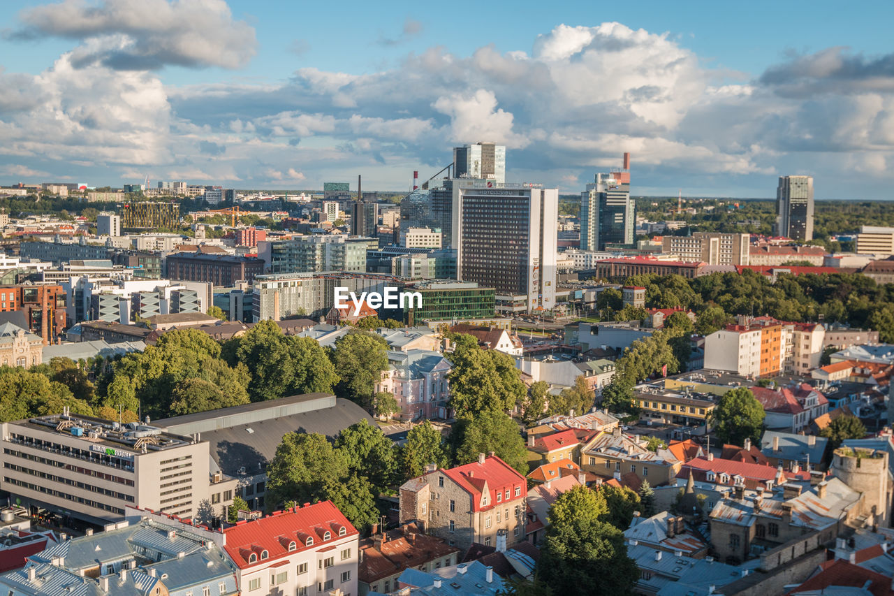 High angle view of buildings in city against sky