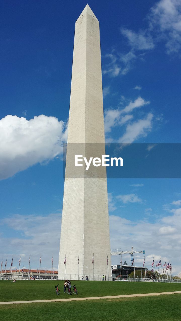 Washington monument surrounded by flags