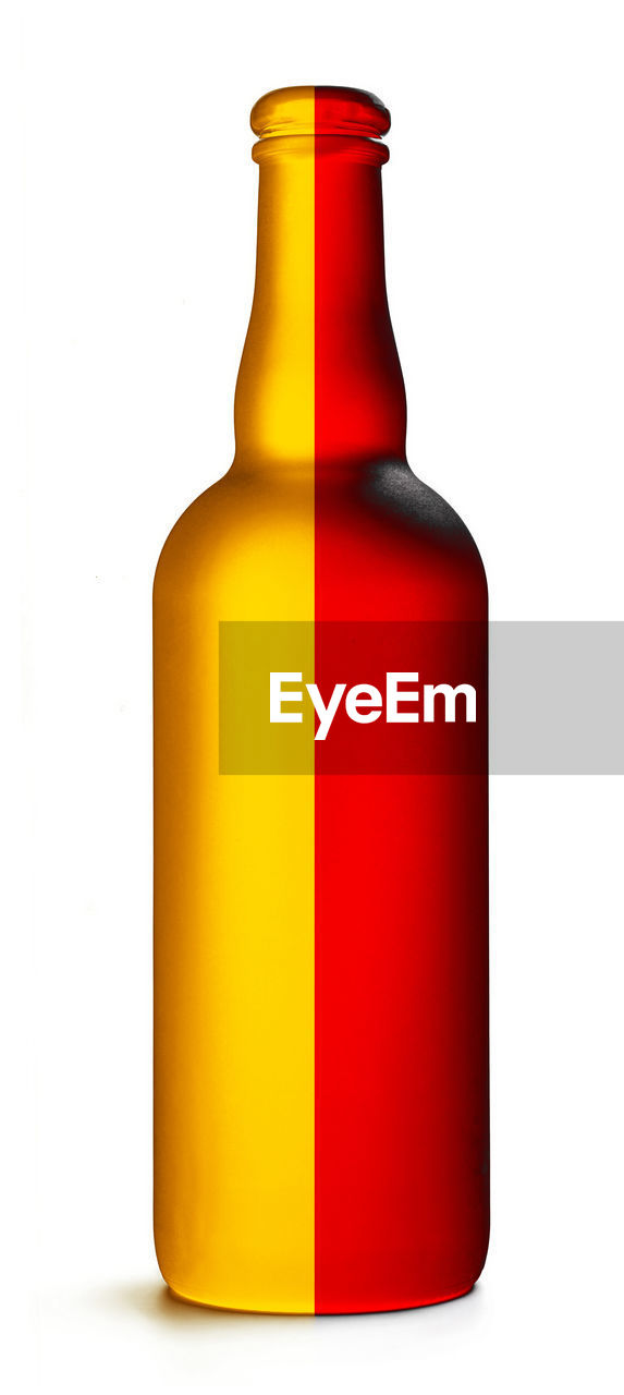 bottle, container, cut out, white background, studio shot, drinkware, glass, food and drink, glass bottle, red, single object, indoors, drink, no people, refreshment, orange, yellow, alcohol, distilled beverage