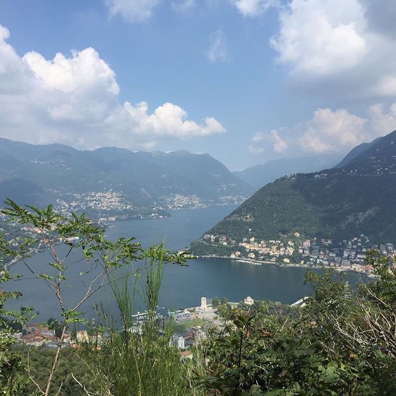 SCENIC VIEW OF RIVER WITH MOUNTAINS IN BACKGROUND