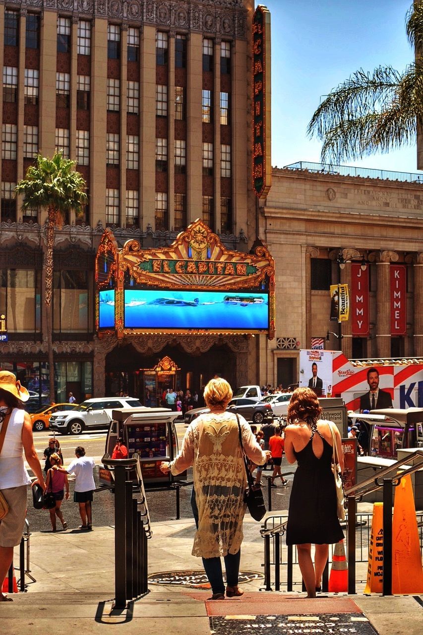 PEOPLE IN FRONT OF BUILDING