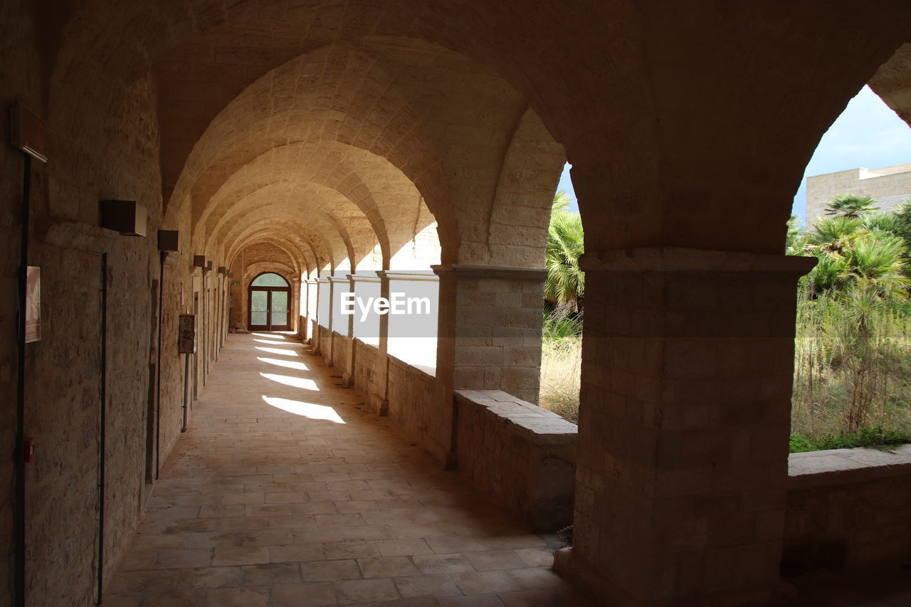 Cloister of the monastery of santa maria di colonna. corridor of old building