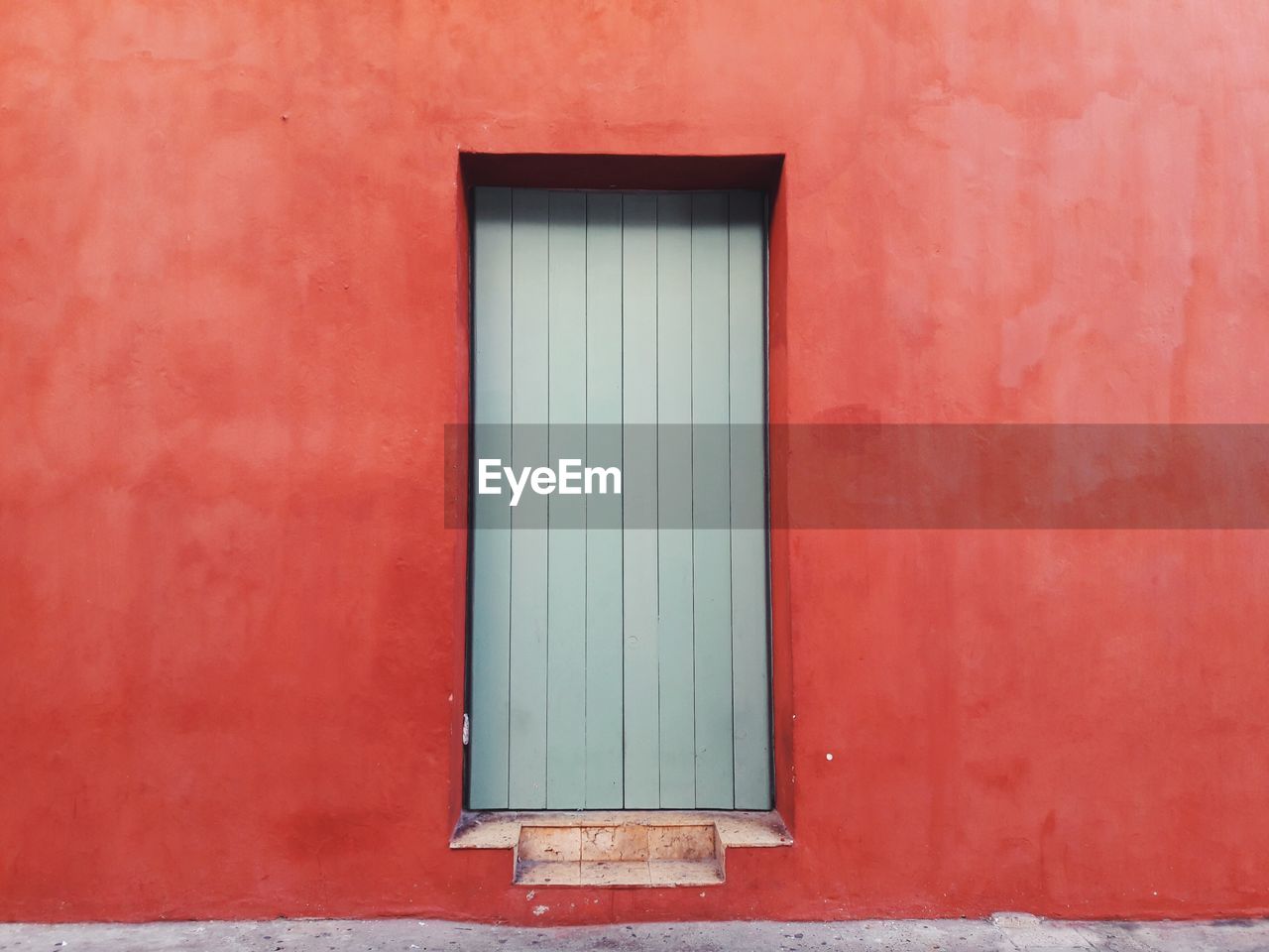 FULL FRAME SHOT OF WINDOW ON BRICK WALL