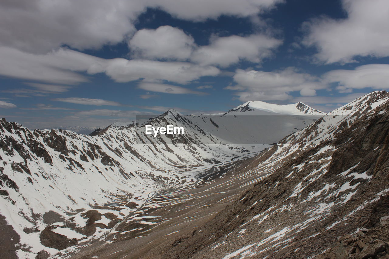 Idyllic shot of snowcapped mountains at ladakh against sky