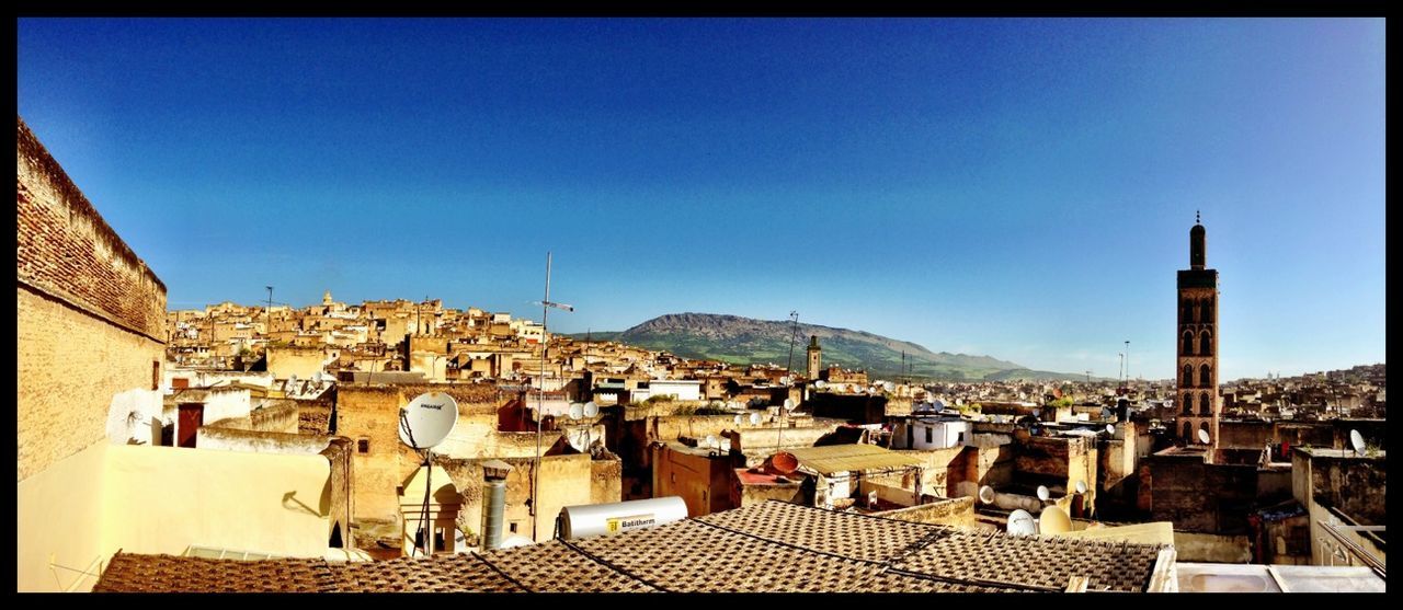 VIEW OF CITYSCAPE AGAINST CLEAR SKY