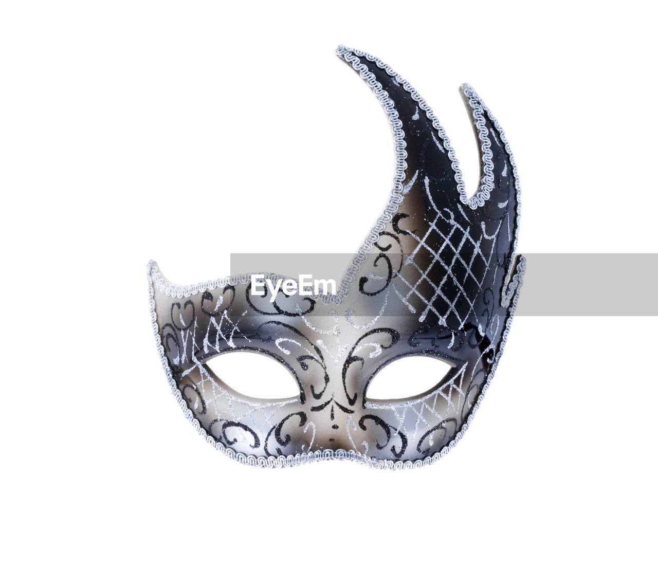 Close-up of venetian mask against white background