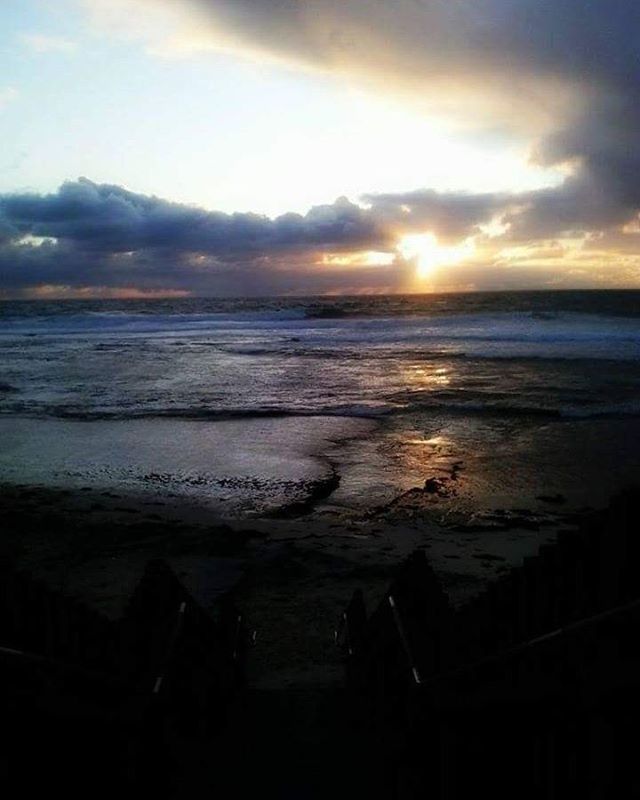 SCENIC VIEW OF SEA DURING SUNSET