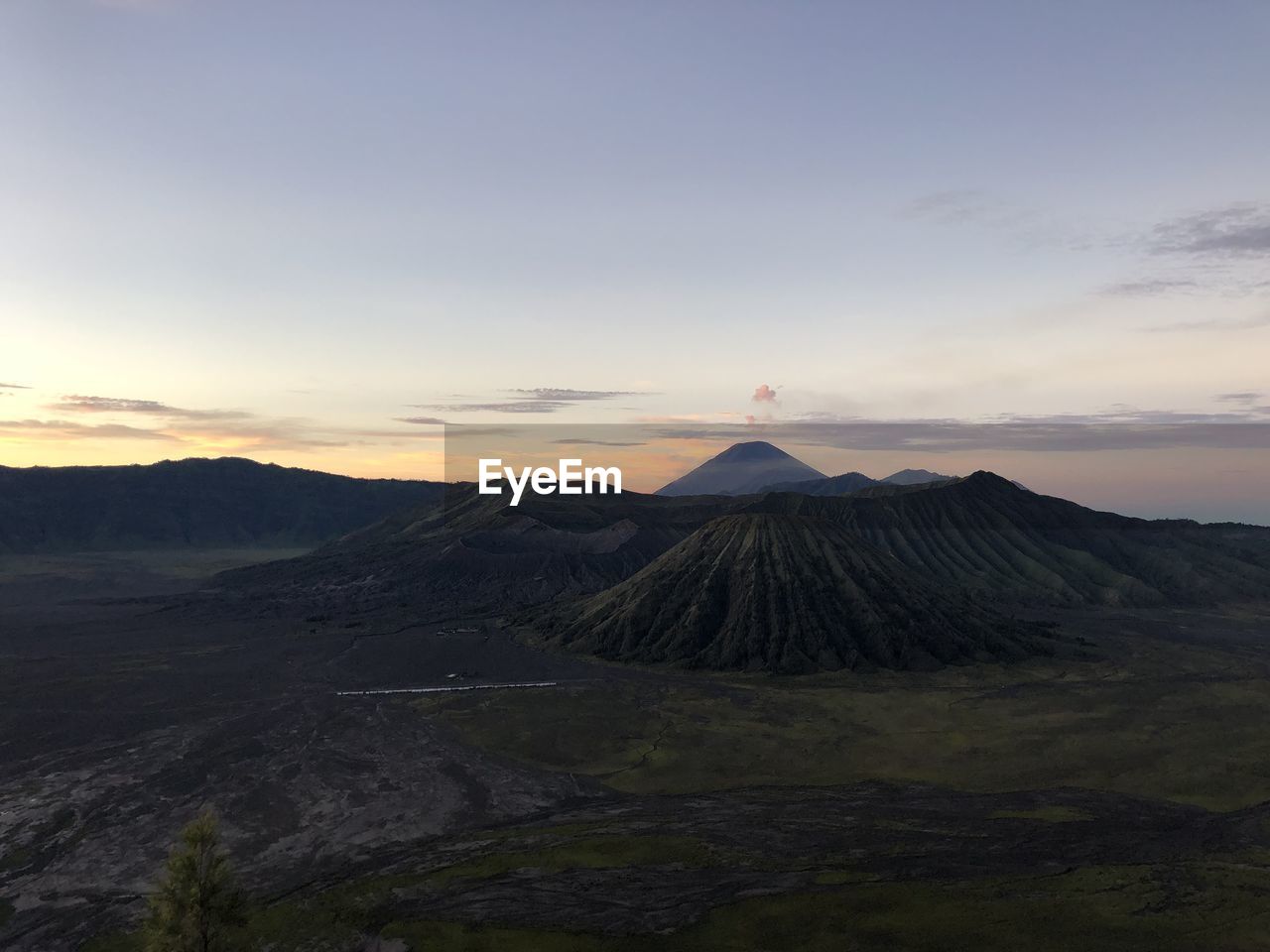 Scenic view of volcanic landscape against sky