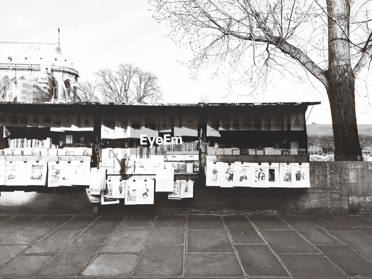Book stall against sky