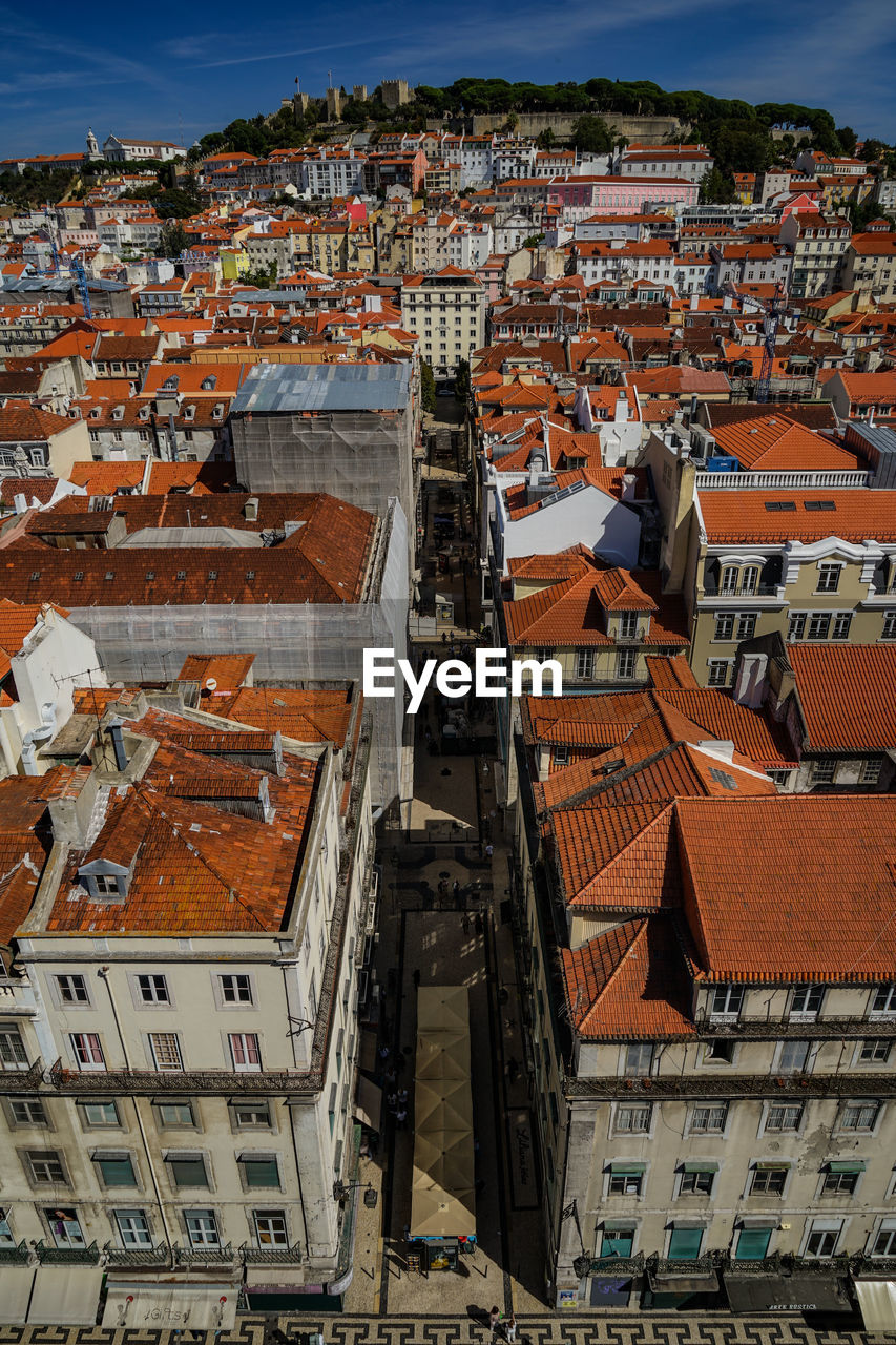 Aerial view of town against sky