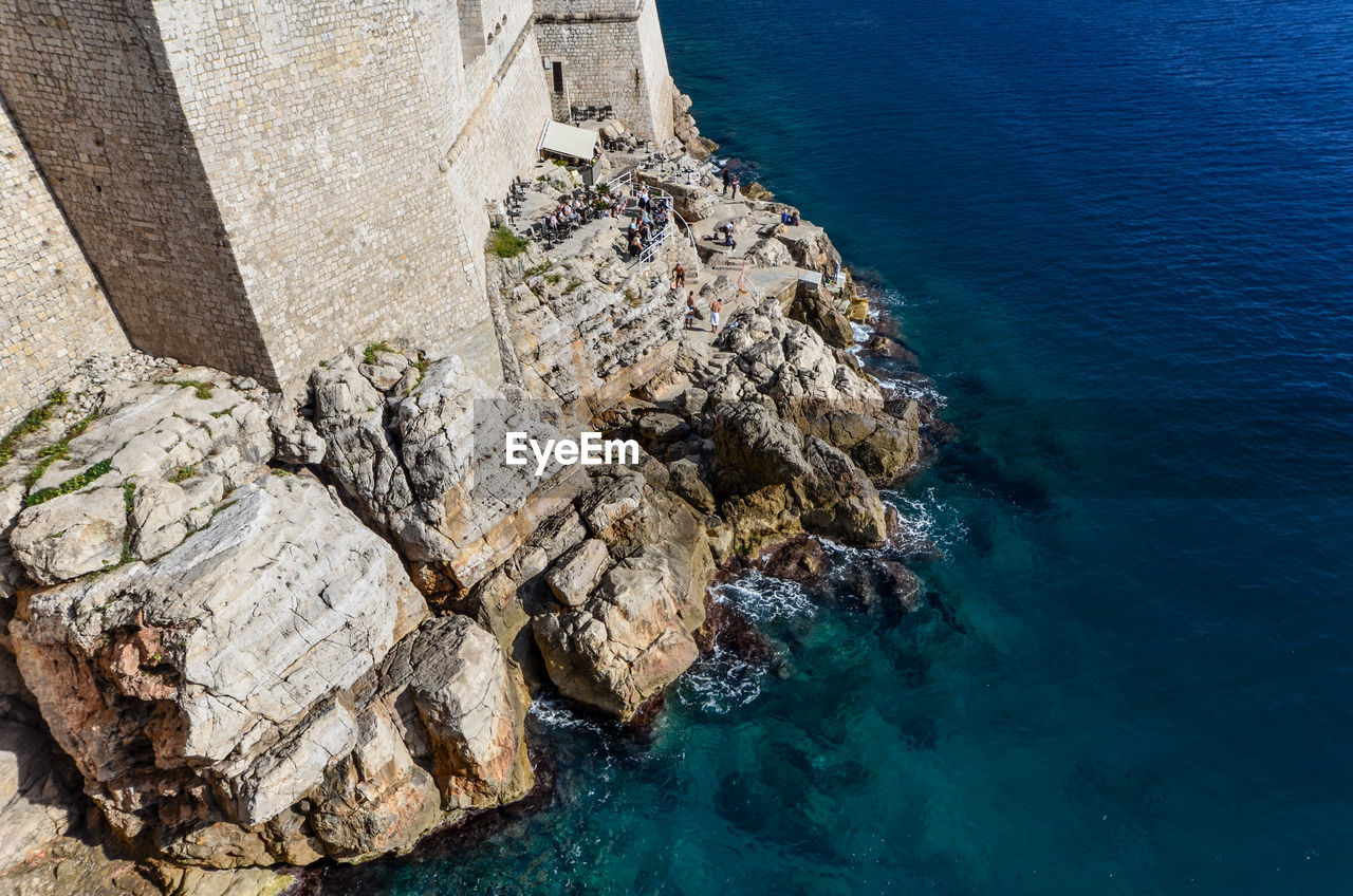 High angle view of rock formation in sea