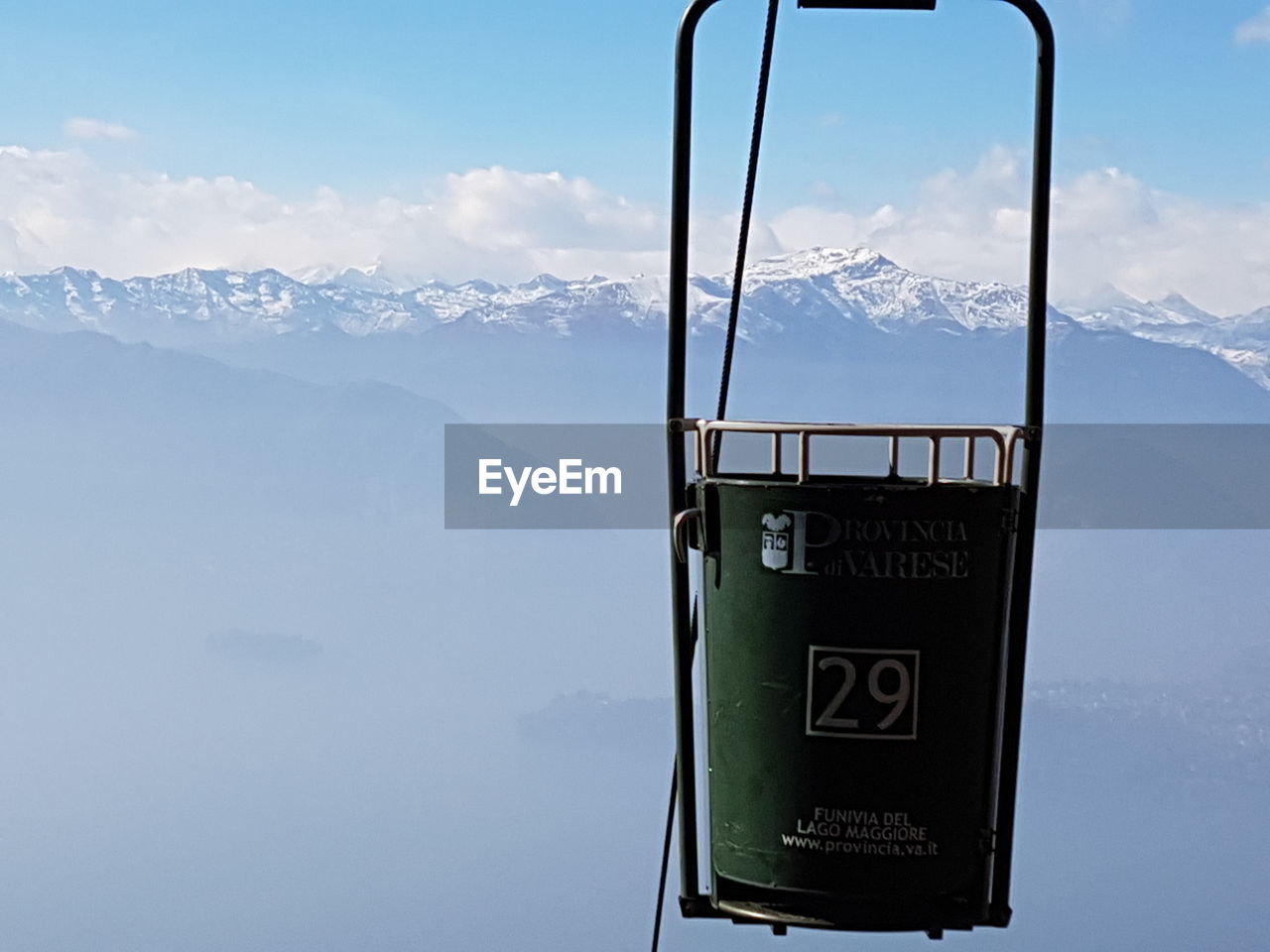 VIEW OF OVERHEAD CABLE CAR AGAINST SKY
