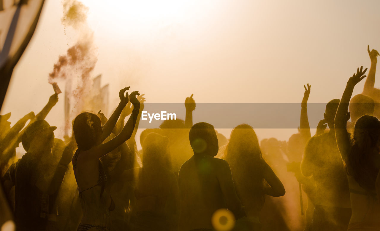 People enjoying beach party