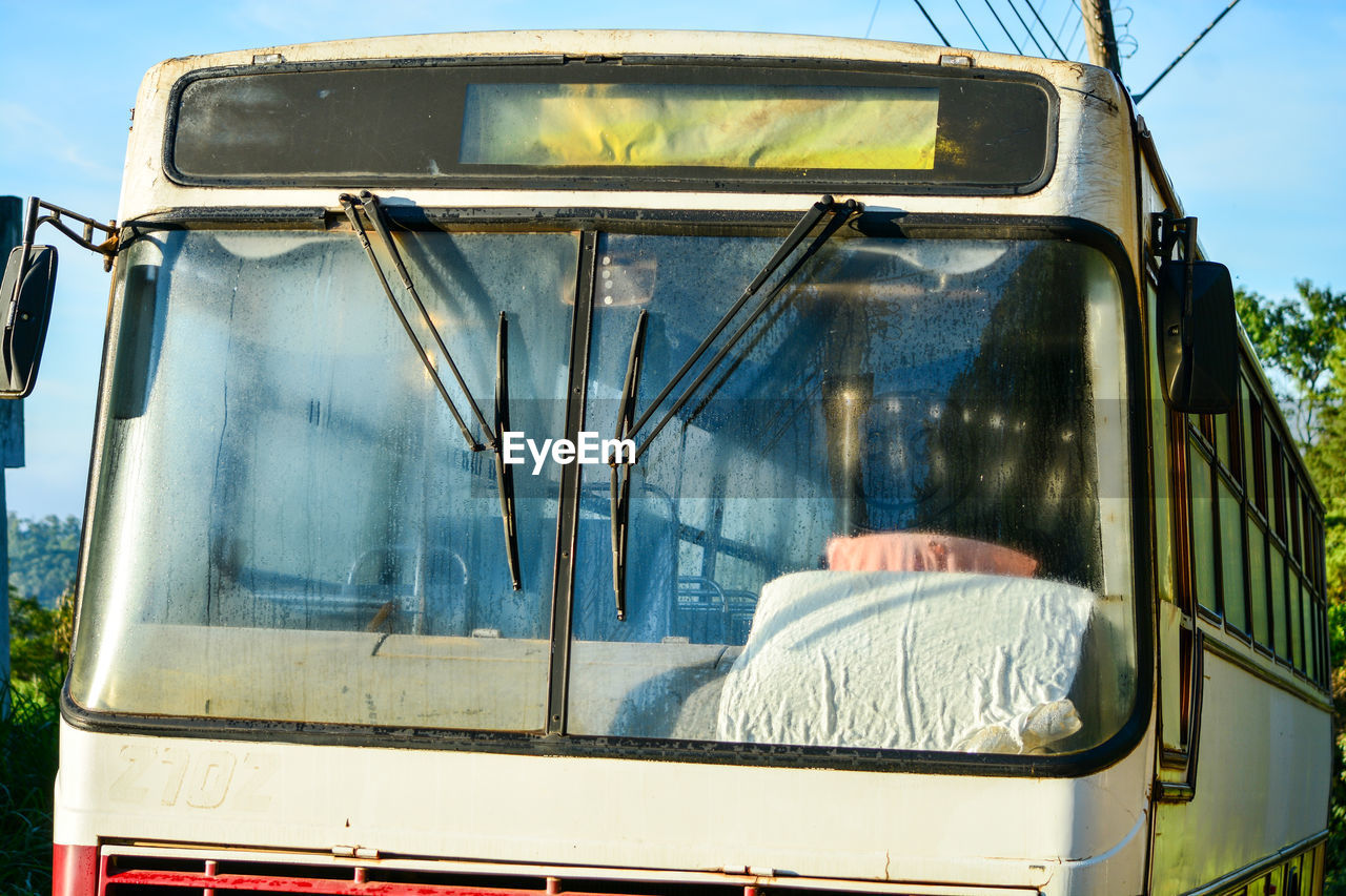 Reflection of draw on bus glass