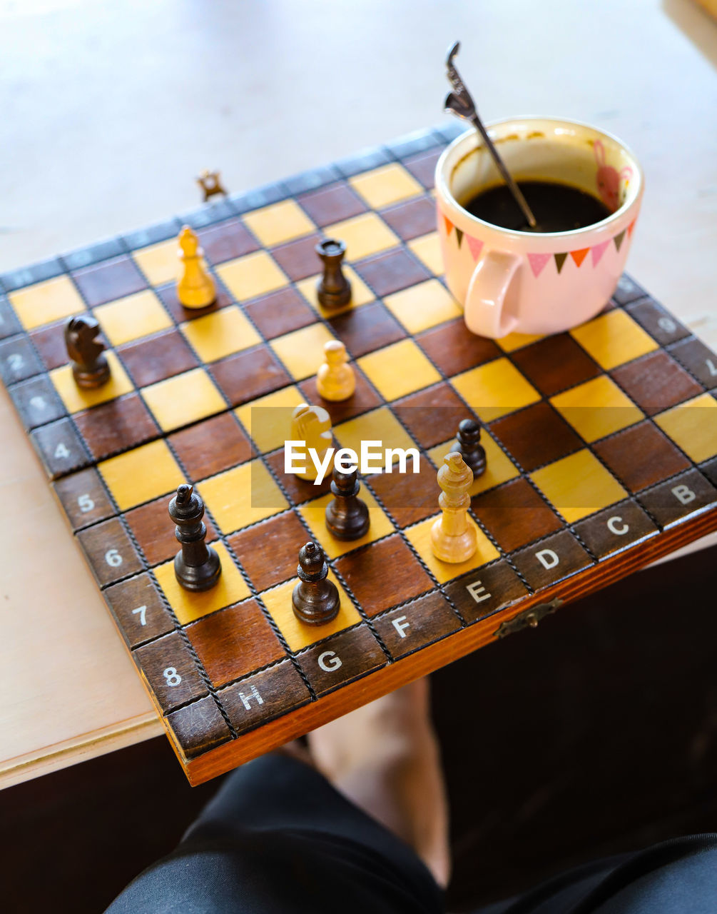 High angle view of coffee cup on table